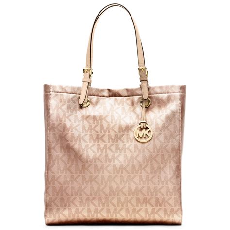 michael kors rose gold metallic handbag|Michael Kors large gold tote.